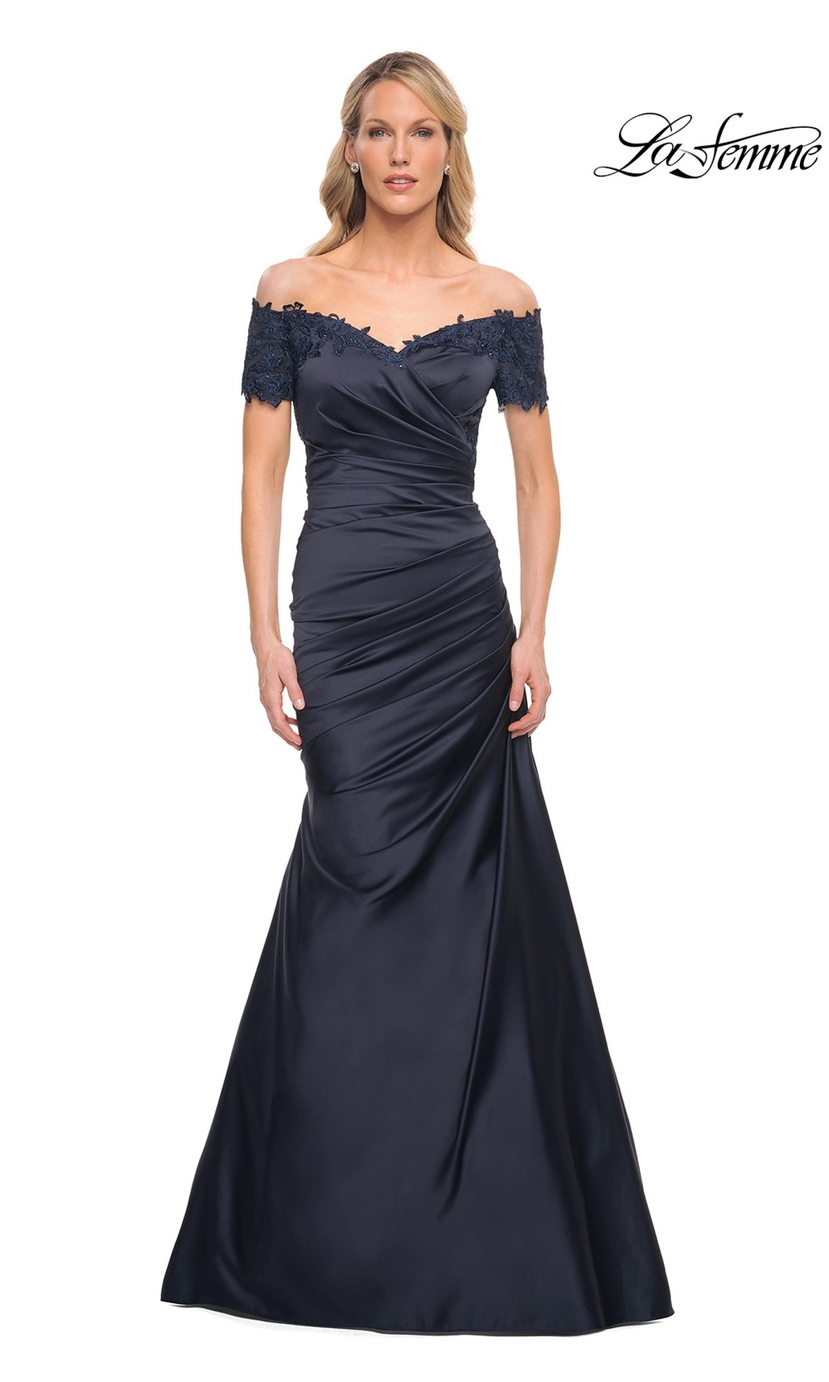 La Femme 30199 navy blue off-the-shoulder mermaid gown with lace sleeves and bodice detailing.
